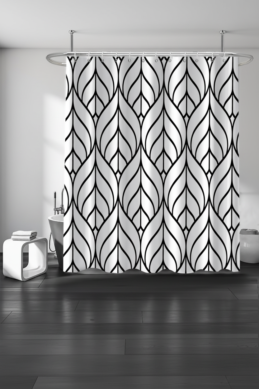 Black and white Art Deco geometric leaf pattern shower curtain hanging in a modern bathroom with dark floor and chrome fixtures