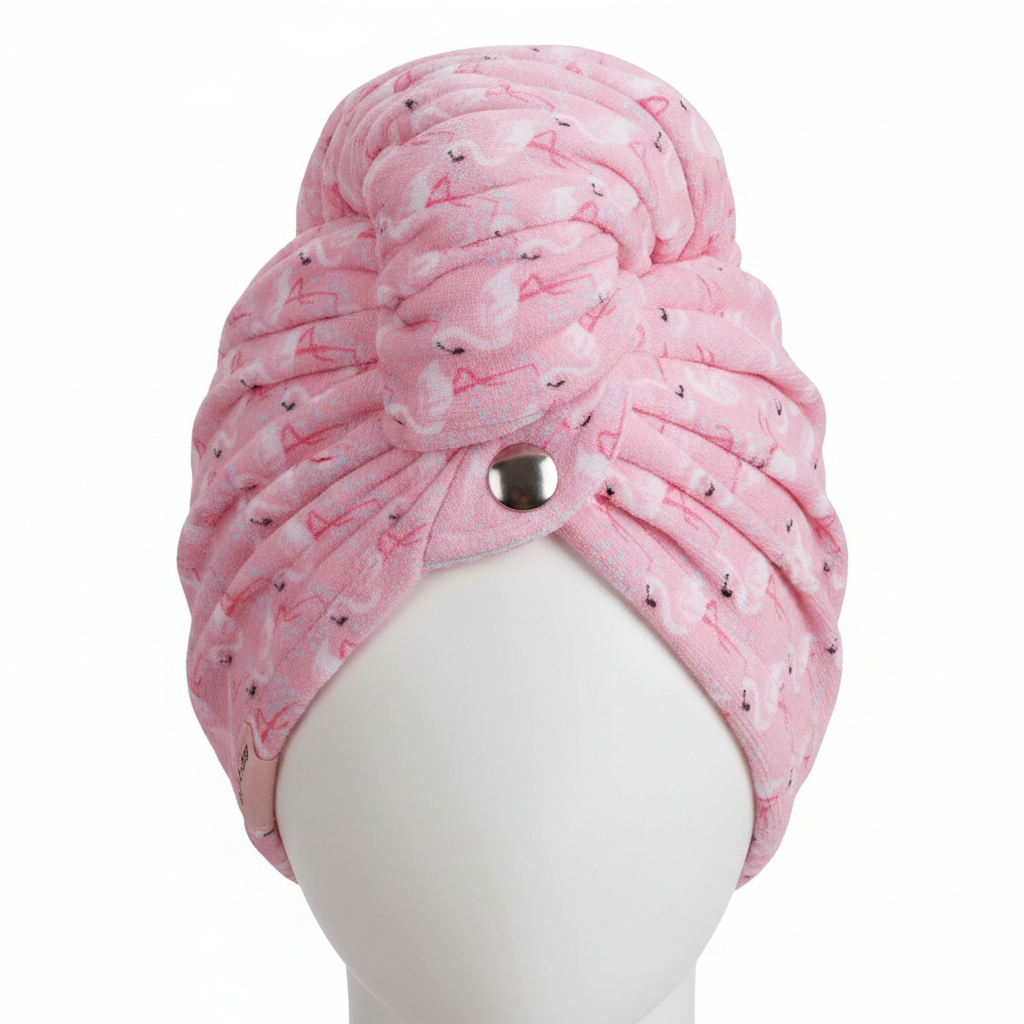 Pink flamingo microfibre hair towel wrap - close-up of fabric texture and metal button fastening