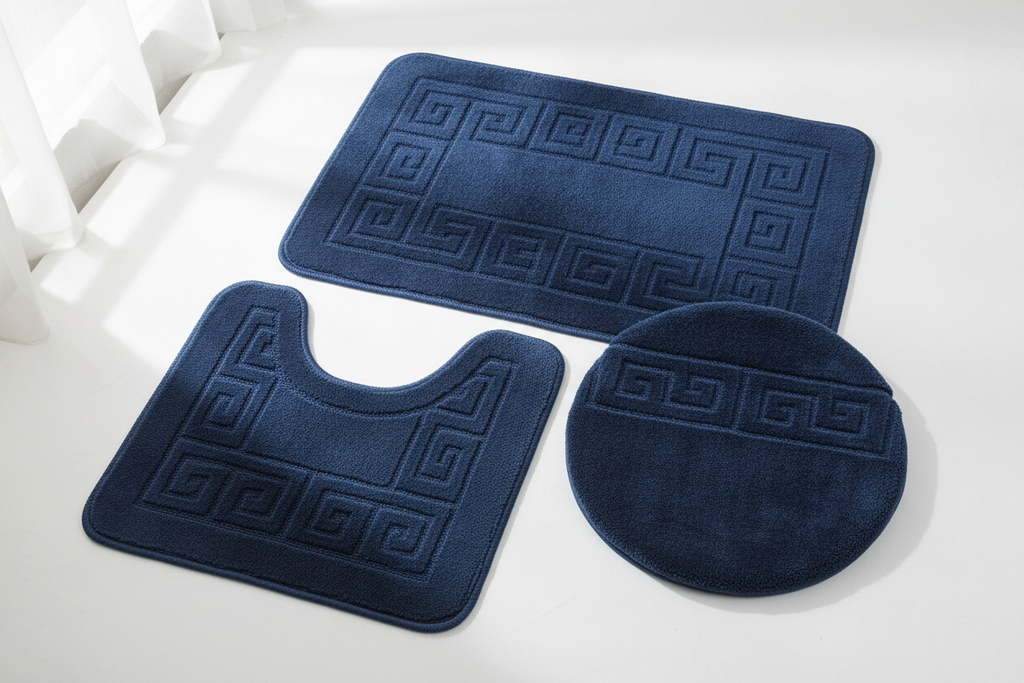 Navy blue 3-piece bath rug set flat lay showing all three pieces